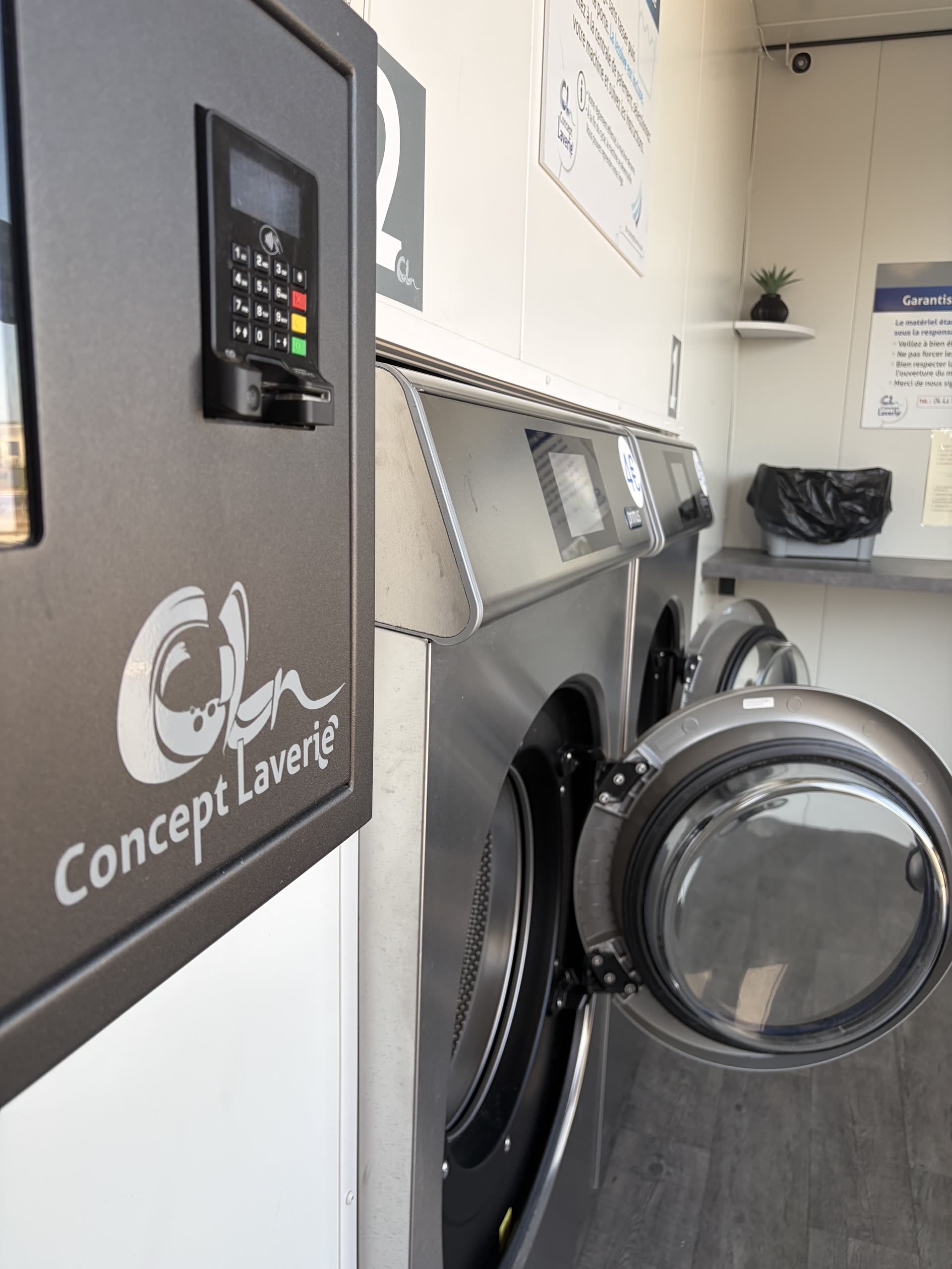Laundry with 8 washing machines and 4 dryers